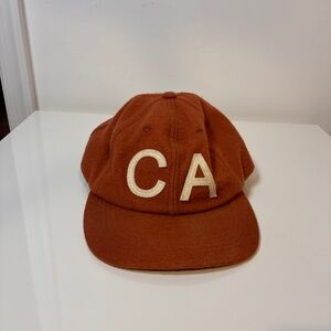 Bradley Mountian CA hat. Terra cotta Wool with brown leather strap